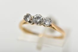 A THREE STONE DIAMOND RING, three single cut diamonds prong set in white metal, approximate total