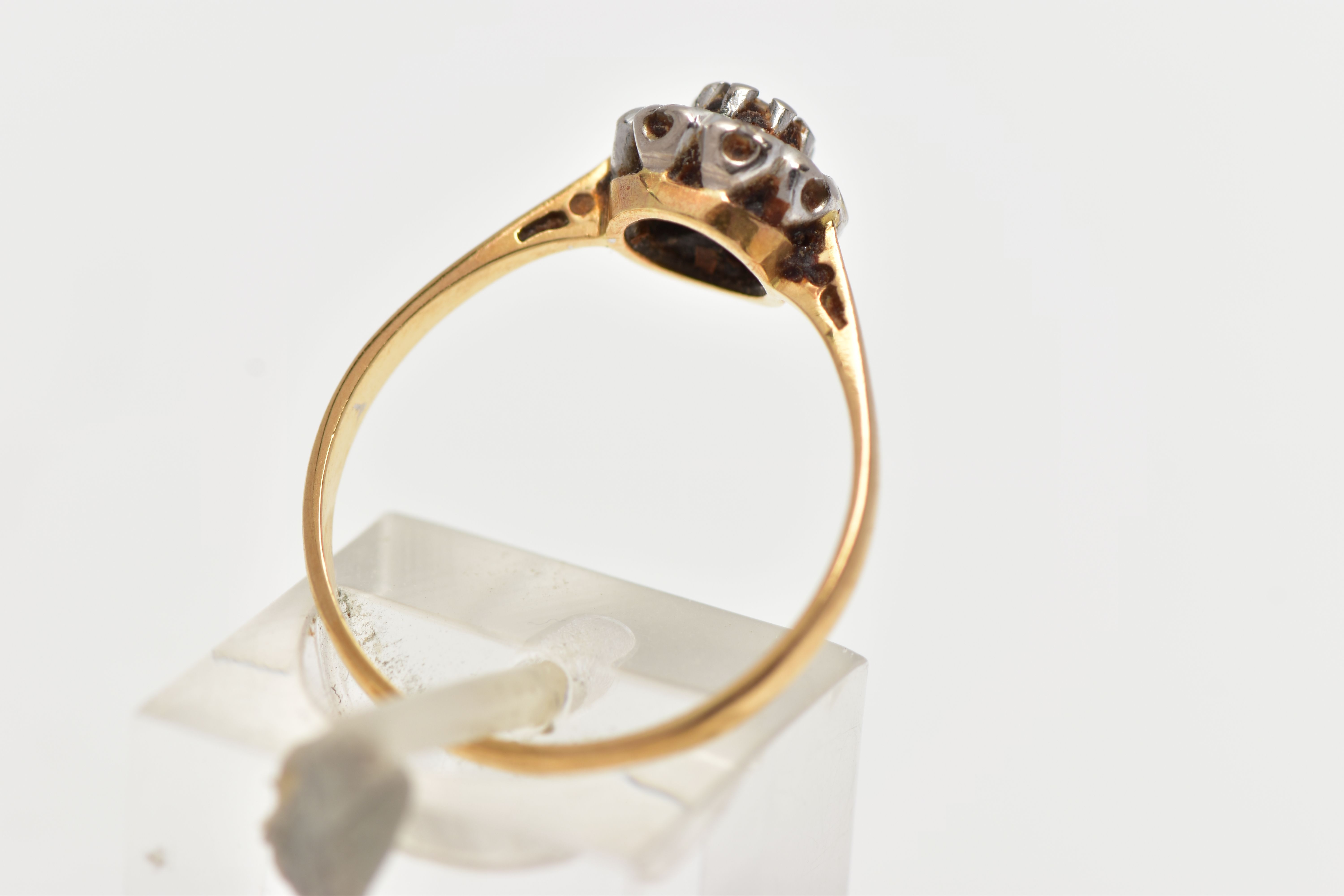 A YELLOW METAL DIAMOND FLOWER RING, set with nine round brilliant cut diamonds, estimated total - Image 3 of 4