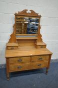 AN EDWARDIAN SATINWOOD DRESSING CHEST, with a single swing mirror, and two drawers, on a base with