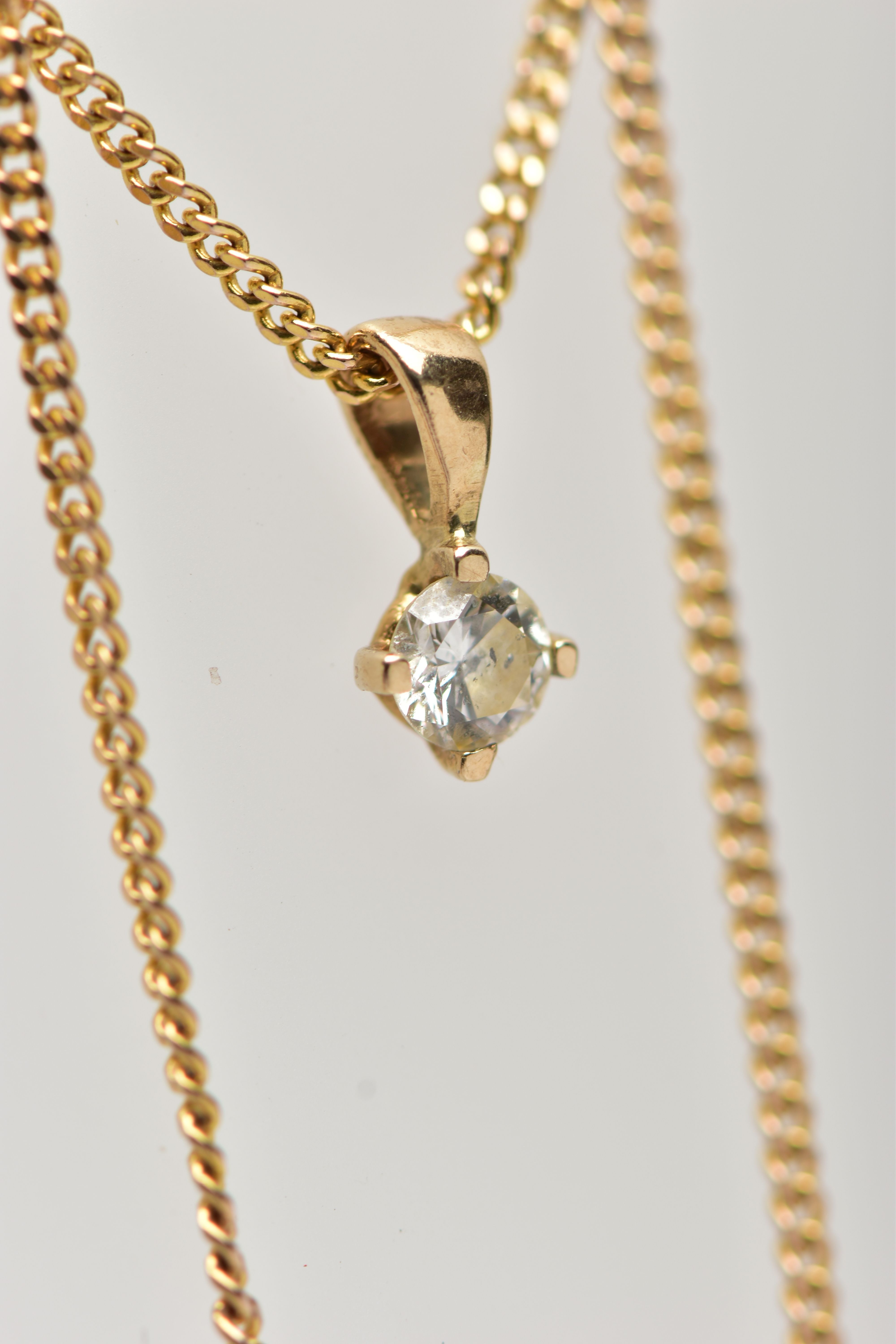 A 9CT GOLD DIAMOND PENDANT NECKLACE, a four claw set, round brilliant cut diamond, estimated diamond - Image 3 of 3