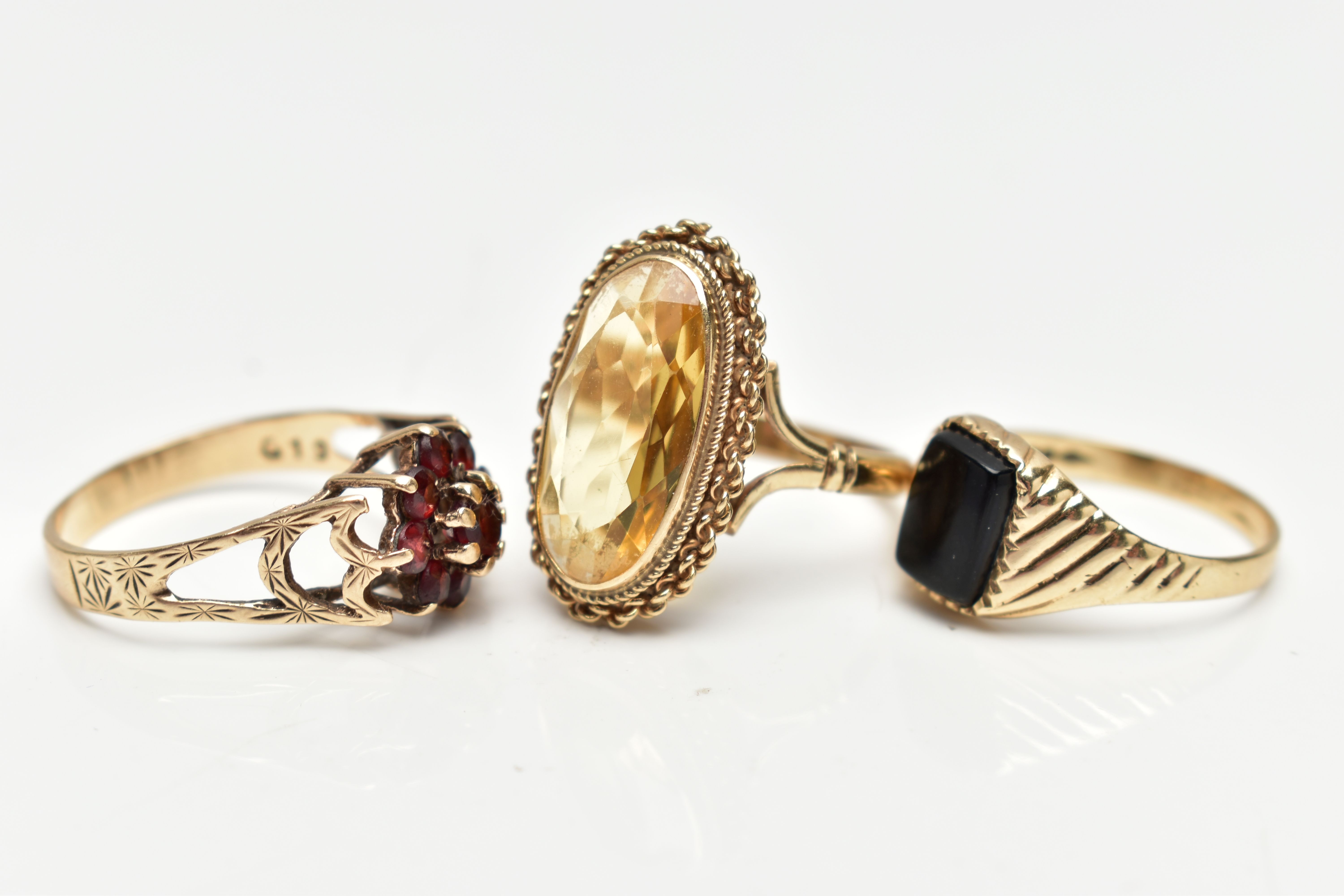 THREE 9CT GOLD RINGS, the first a yellow gold signet ring, set with a rectangular cut onyx stone, - Image 2 of 4