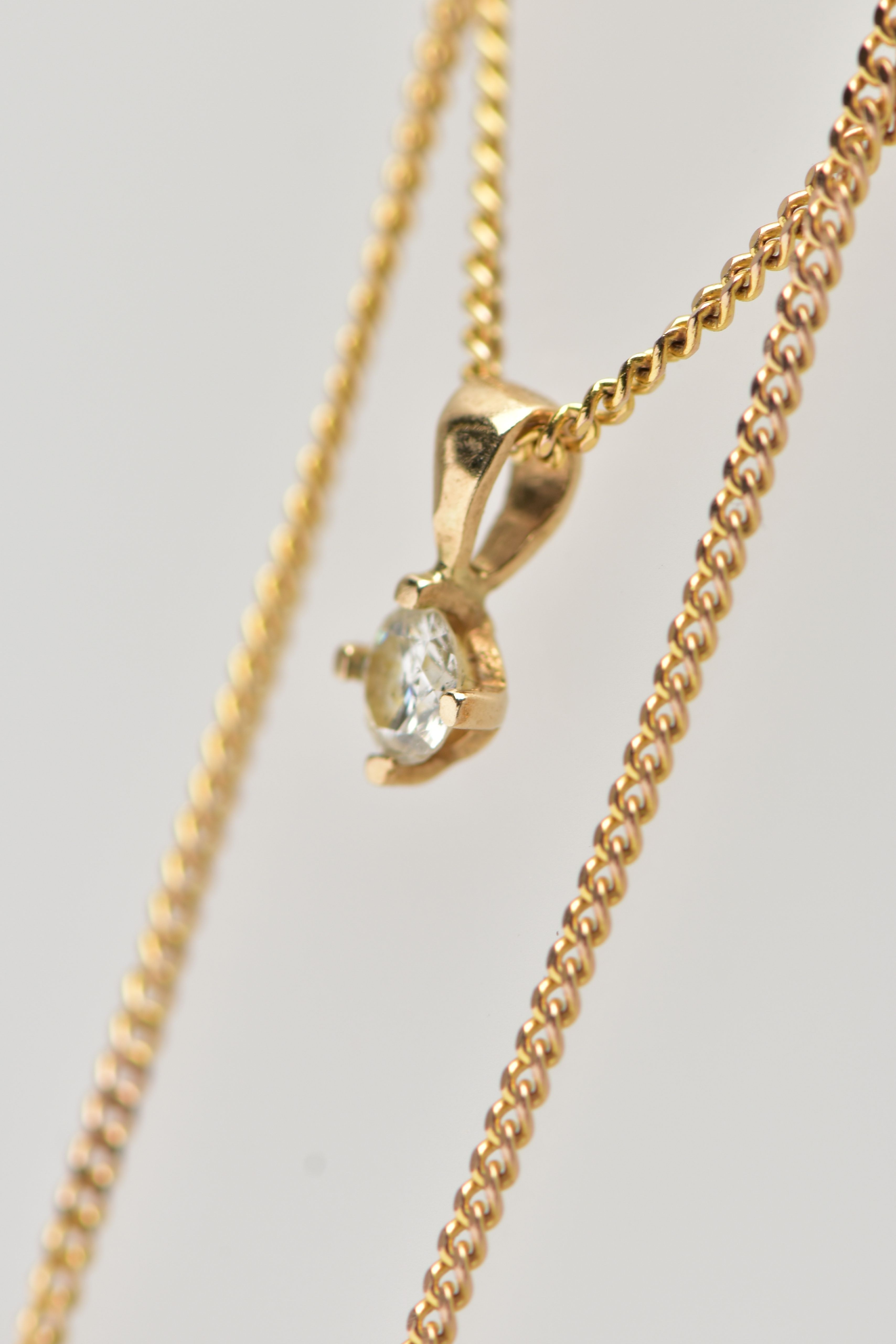 A 9CT GOLD DIAMOND PENDANT NECKLACE, a four claw set, round brilliant cut diamond, estimated diamond - Image 2 of 3