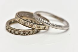 A 9CT GOLD RING AND TWO WHITE METAL RINGS, the first a white and yellow gold textured band ring,