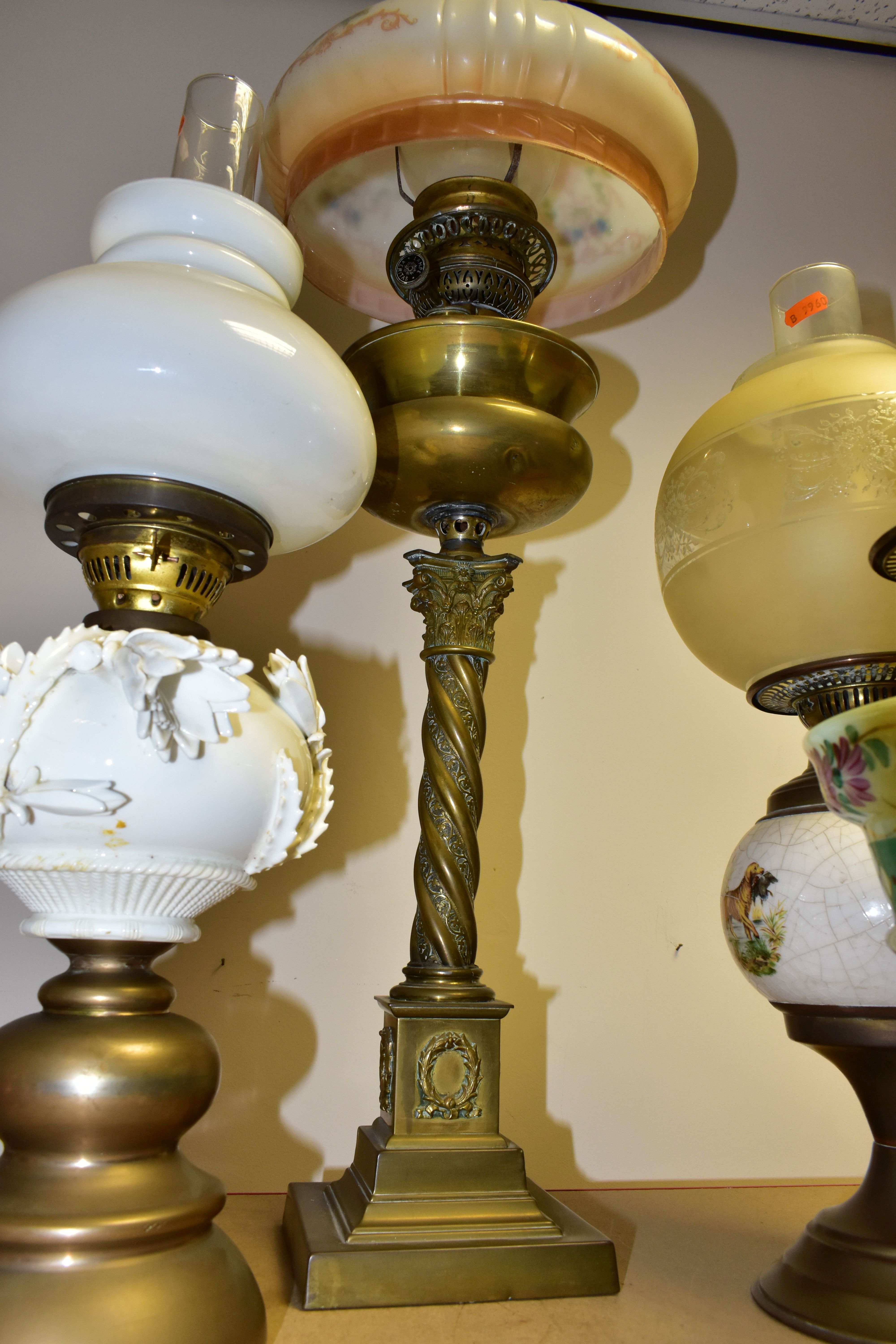 FOUR VICTORIAN OIL LAMPS, comprising an Eltex oil lamp with a brass base and fittings a white - Image 11 of 11