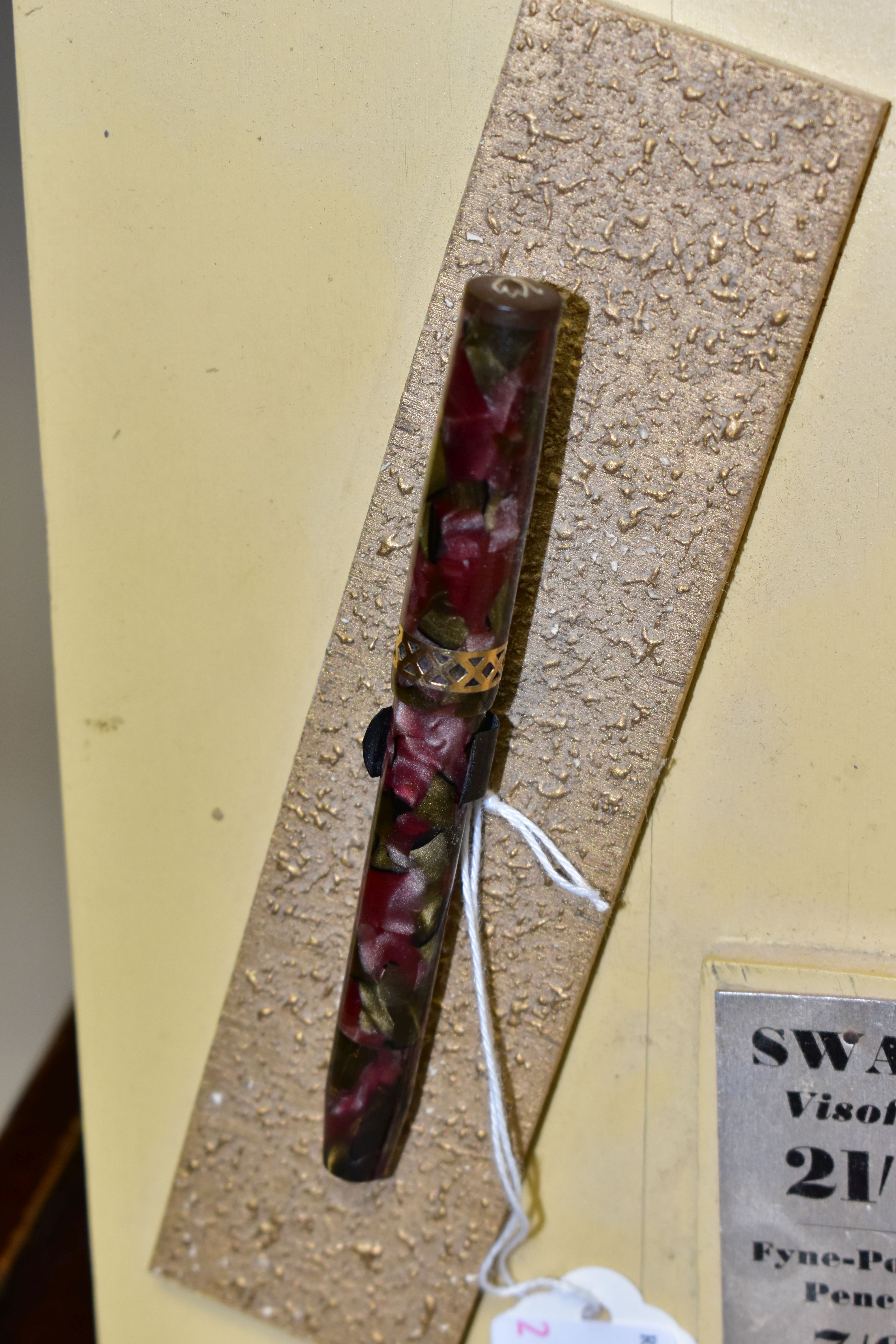 A SWAN PENS SHOW STAND ADVERTISING DISPLAY, the freestanding wooden stand having red capital 'Swan - Image 2 of 5