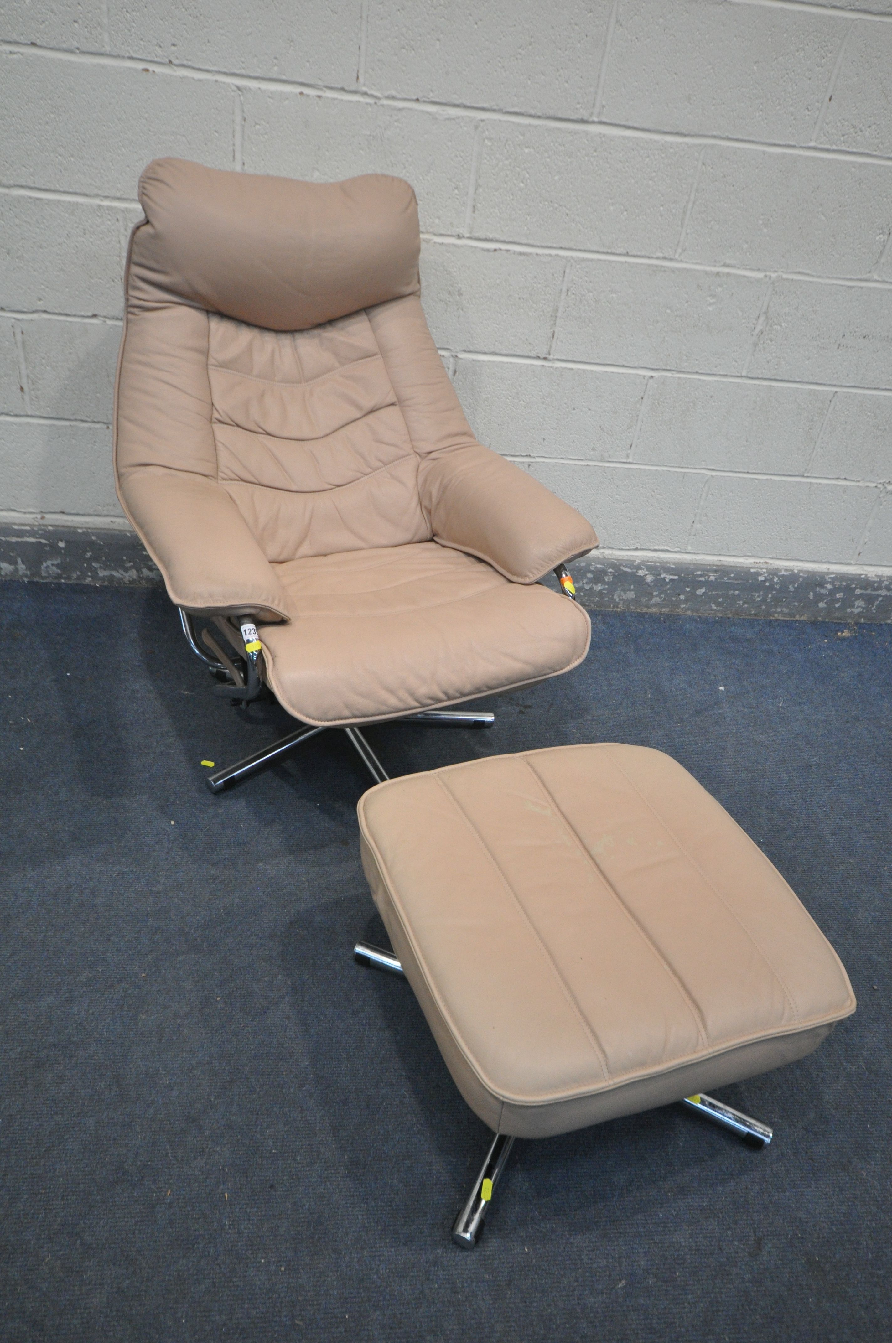 POSSIBLY SKOGHAUG INDUSTRI, A PINK LEATHER AND CHROME RECLINING ARMCHAIR, and a matching