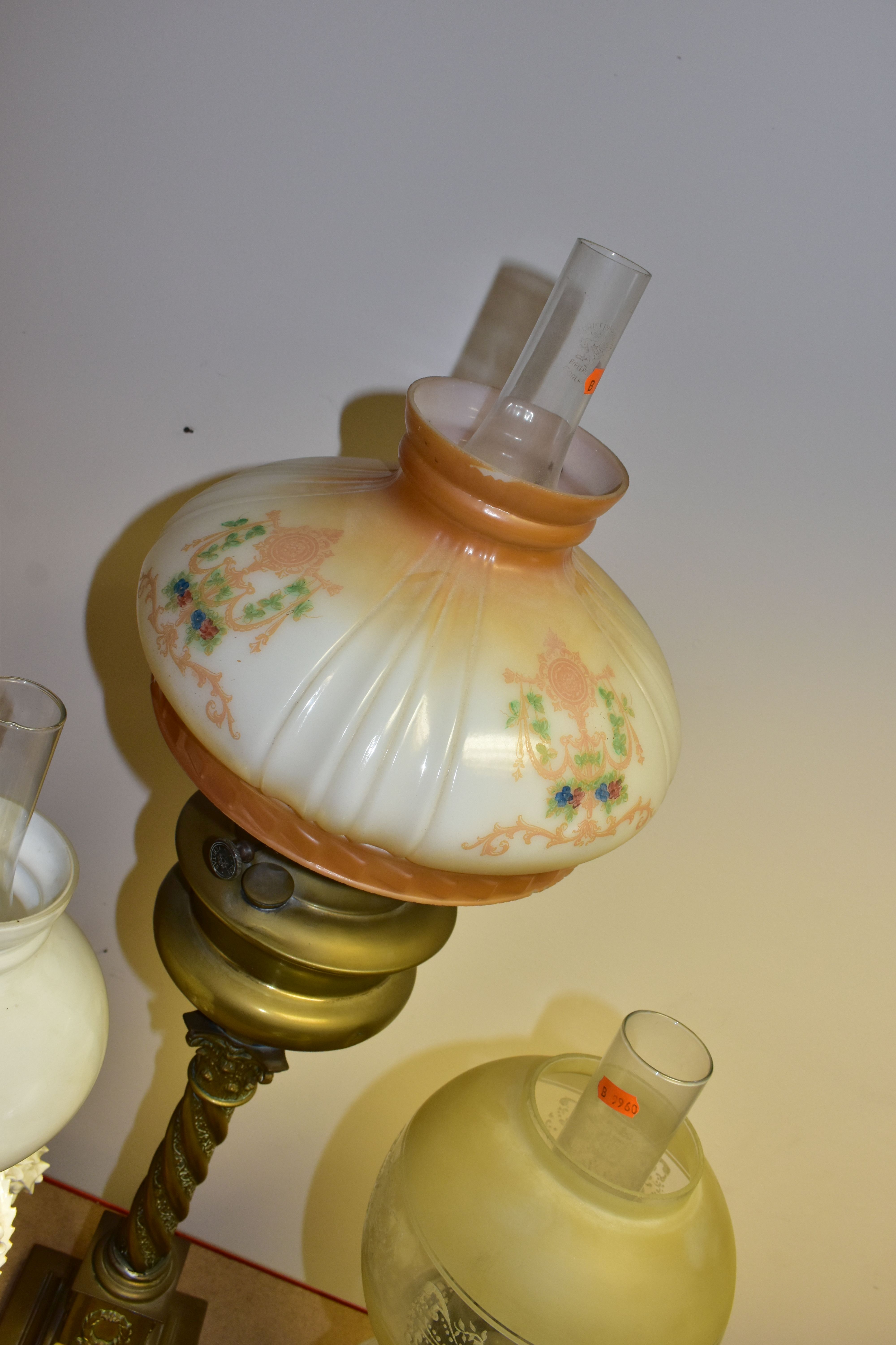 FOUR VICTORIAN OIL LAMPS, comprising an Eltex oil lamp with a brass base and fittings a white - Image 10 of 11