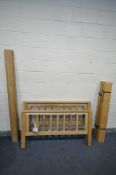 A SOLID OAK 4FT6 BEDSTEAD (condition - dismantled but bolts appear present, discoloration to