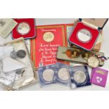 A SMALL BOX OF COINS AND COMMEMORATIVES, to include a few silver coins 1923 Peace Dollar 2x 1977