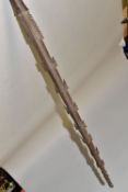 A WOODEN SPEAR, possibly Fijian, with carved barbs and incised pattern, length approximately