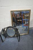 A RECTANGULAR GILT FRAMED BEVELED EDGE WALL MIRROR, 98cm x 58cm and an ebonized triple