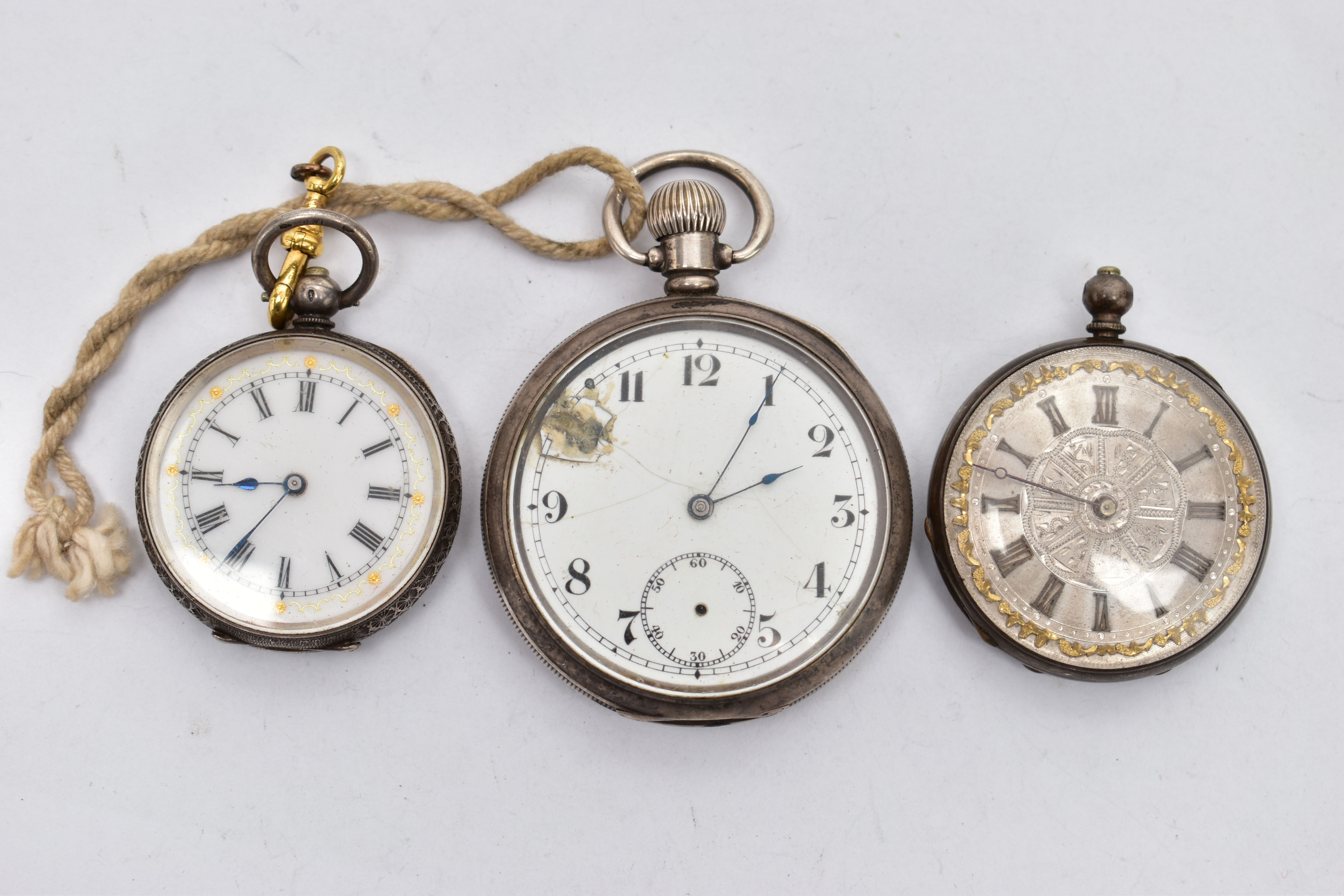 THREE OPEN FACE POCKET WATCHES, the first a silver cased pocket watch, hand wound movement, Arabic