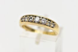 AN 18CT YELLOW GOLD, DIAMOND HALF ETERNITY RING, set with seven graduated round brilliant cut