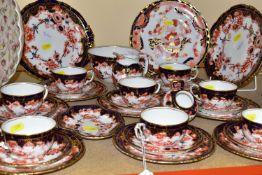 A ROYAL CROWN DERBY 5852 IMARI WARE TEA SET, comprising one milk jug, one slop bowl, two bread and