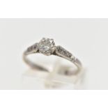 A SINGLE DIAMOND RING, a round brilliant cut diamond, six prong set in white metal, approximate