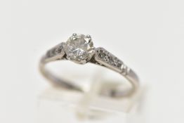 A SINGLE DIAMOND RING, a round brilliant cut diamond, six prong set in white metal, approximate