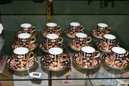 TWELVE ROYAL CROWN DERBY COFFEE CANS AND SAUCERS, in the Traditional Imari 2451 pattern, each with