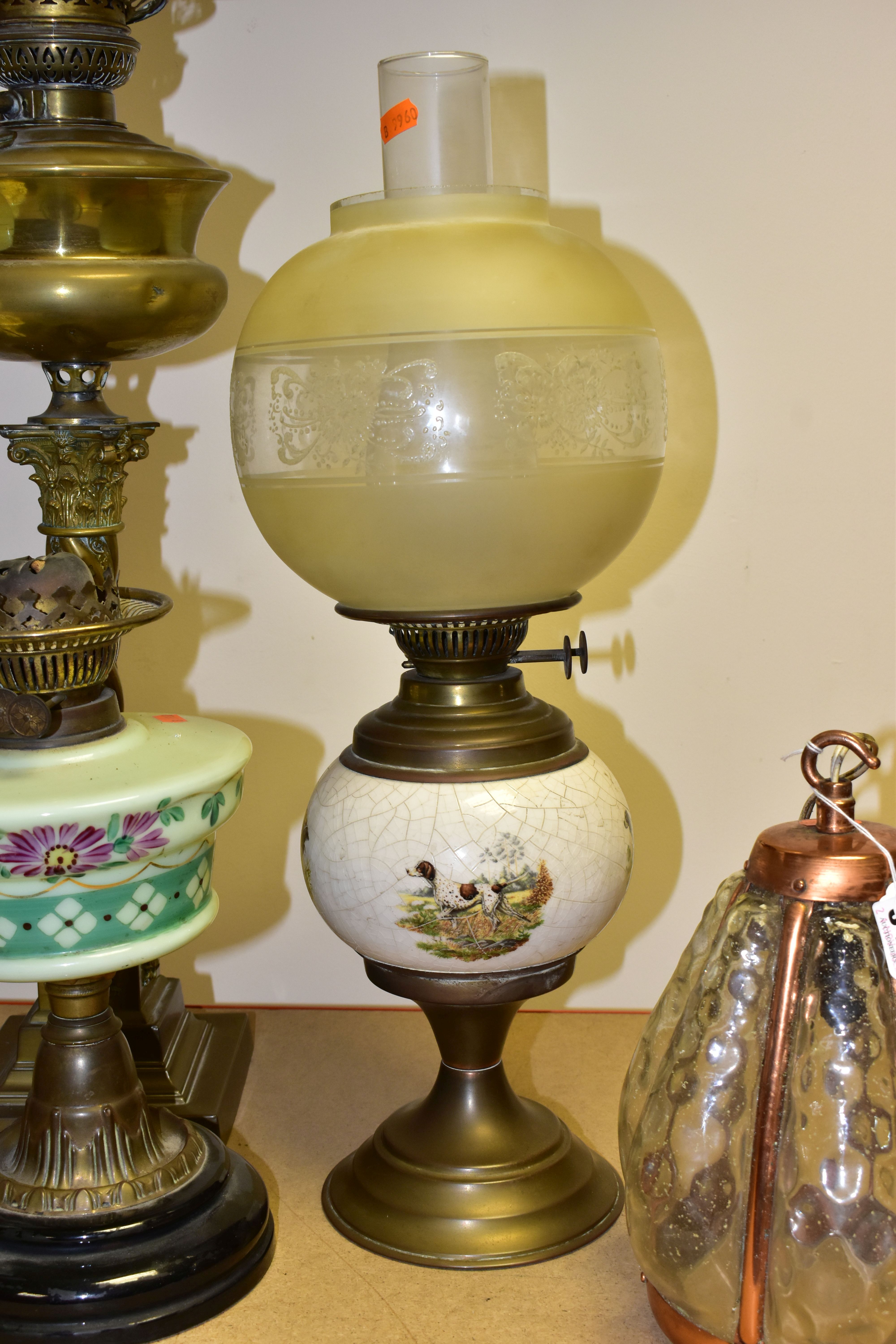 FOUR VICTORIAN OIL LAMPS, comprising an Eltex oil lamp with a brass base and fittings a white - Image 8 of 11