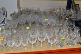 A QUANTITY OF CUT CRYSTAL DRINKING GLASSES, comprising six Stuart Crystal 'Cascade' pattern wine