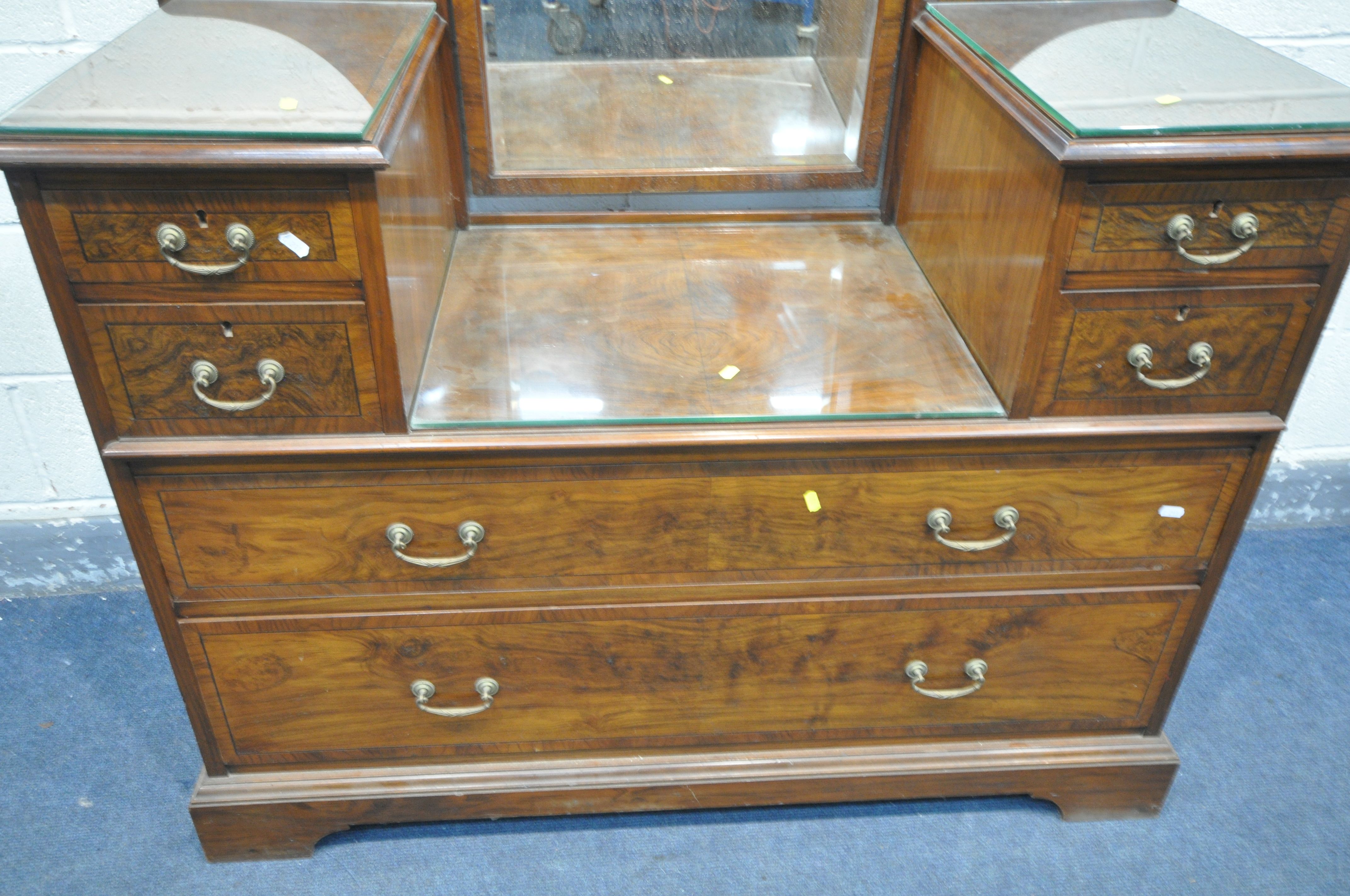 A 20TH CENTURY WALNUT DRESSING CHEST, with a single rectangular swing mirror, and an arrangement - Image 4 of 4
