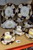 A GROUP OF COALPORT COBALT BLUE AND GILT BATWING TEA WARES, comprising a square twin handled serving