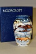 A BOXED MOORCROFT POTTERY 'WOODSIDE FARM' VASE, designed by Anji Davenport, the tube lined design