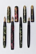 FOUR FOUNTAIN PENS, the first a pink pearlescent pen, fitted with a yellow metal nib, signed 'Duro