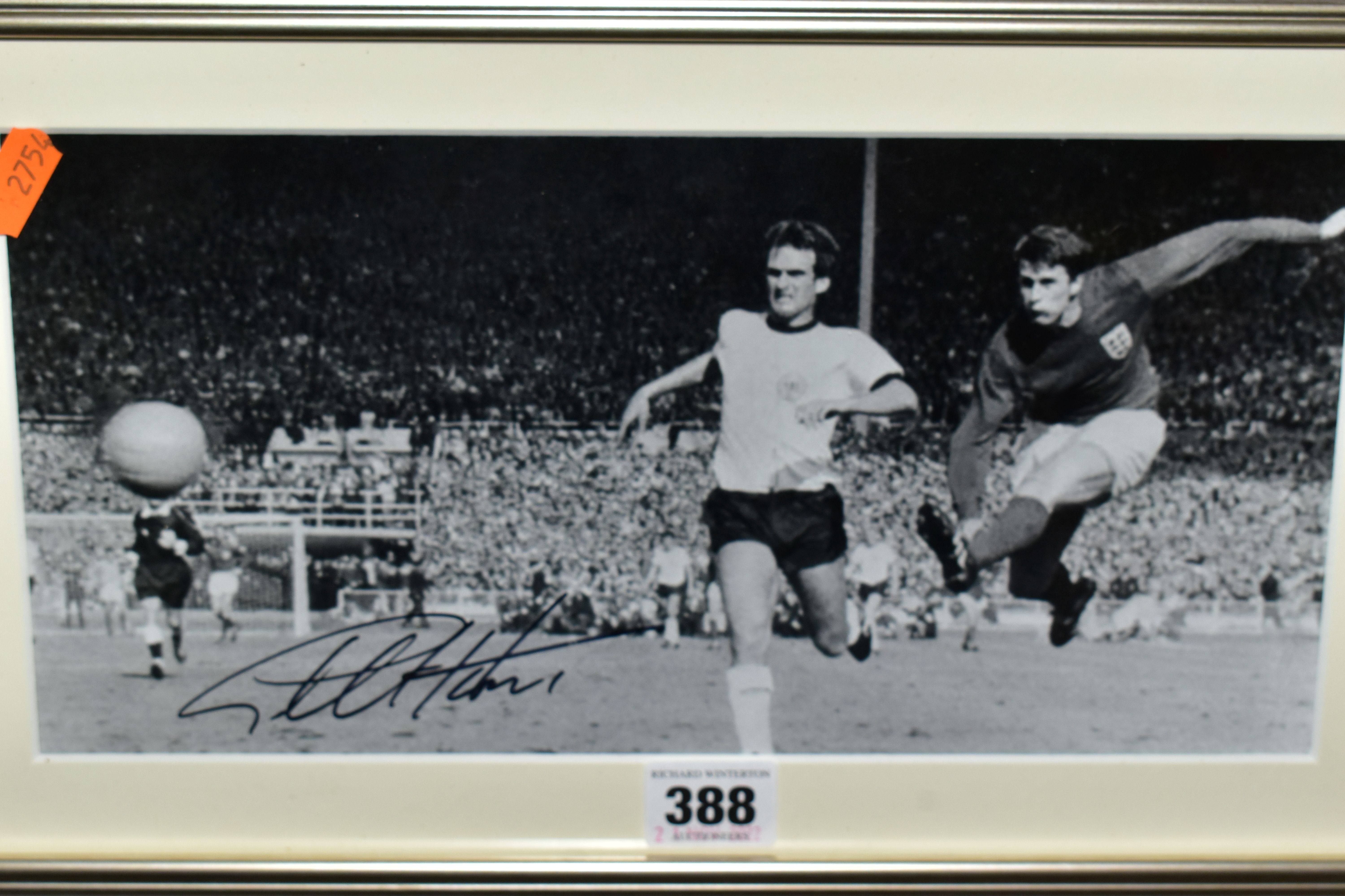 A SIGNED PHOTOGRAPH OF GEOFF HURST SCORING THE FOURTH GOAL IN DURING ENGLANDS 1966 WORLD CUP WIN, - Image 2 of 3