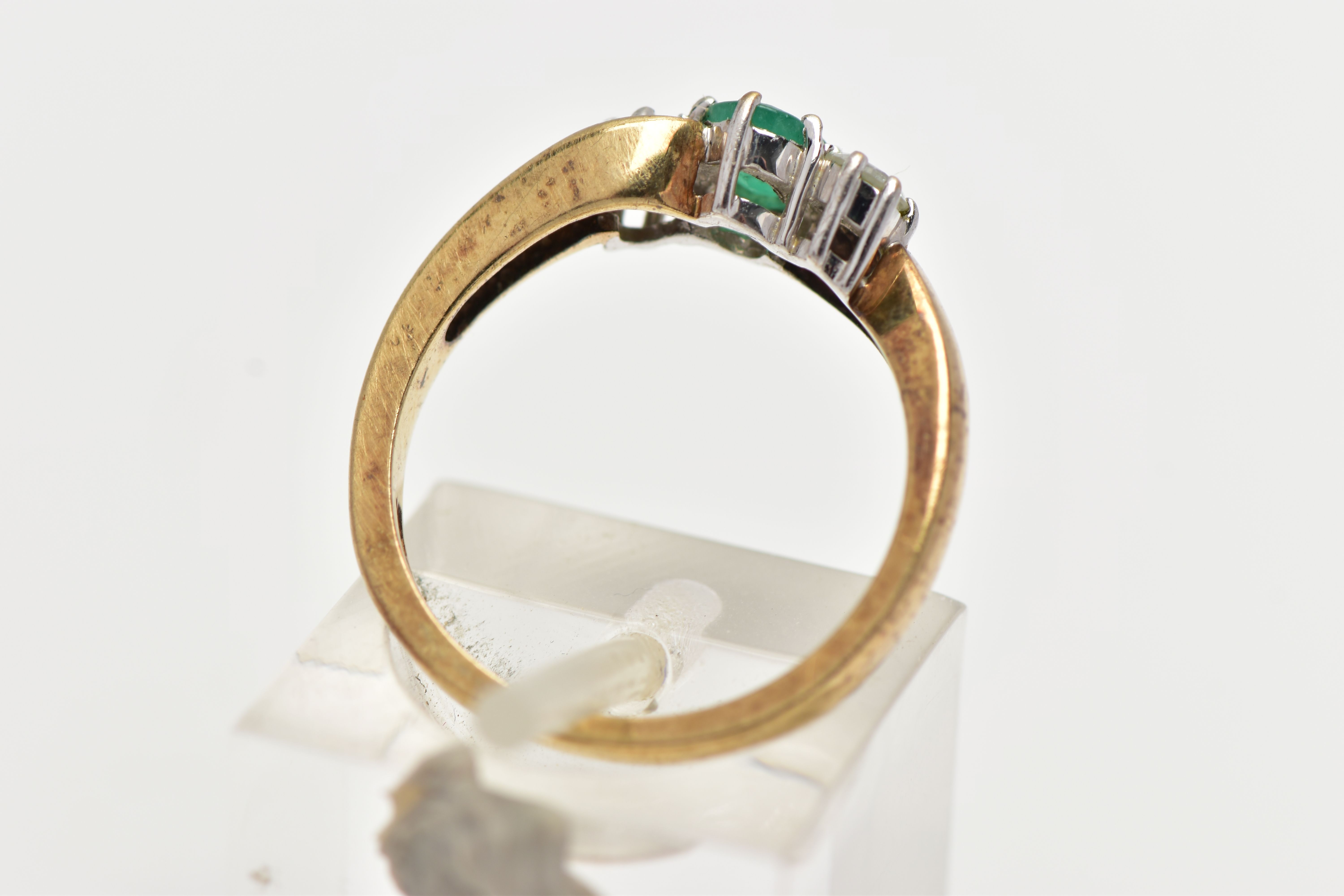 A 9CT GOLD EMERALD AND DIAMOND RING, centrally set with an oval cut emerald in a six claw setting, - Image 3 of 4