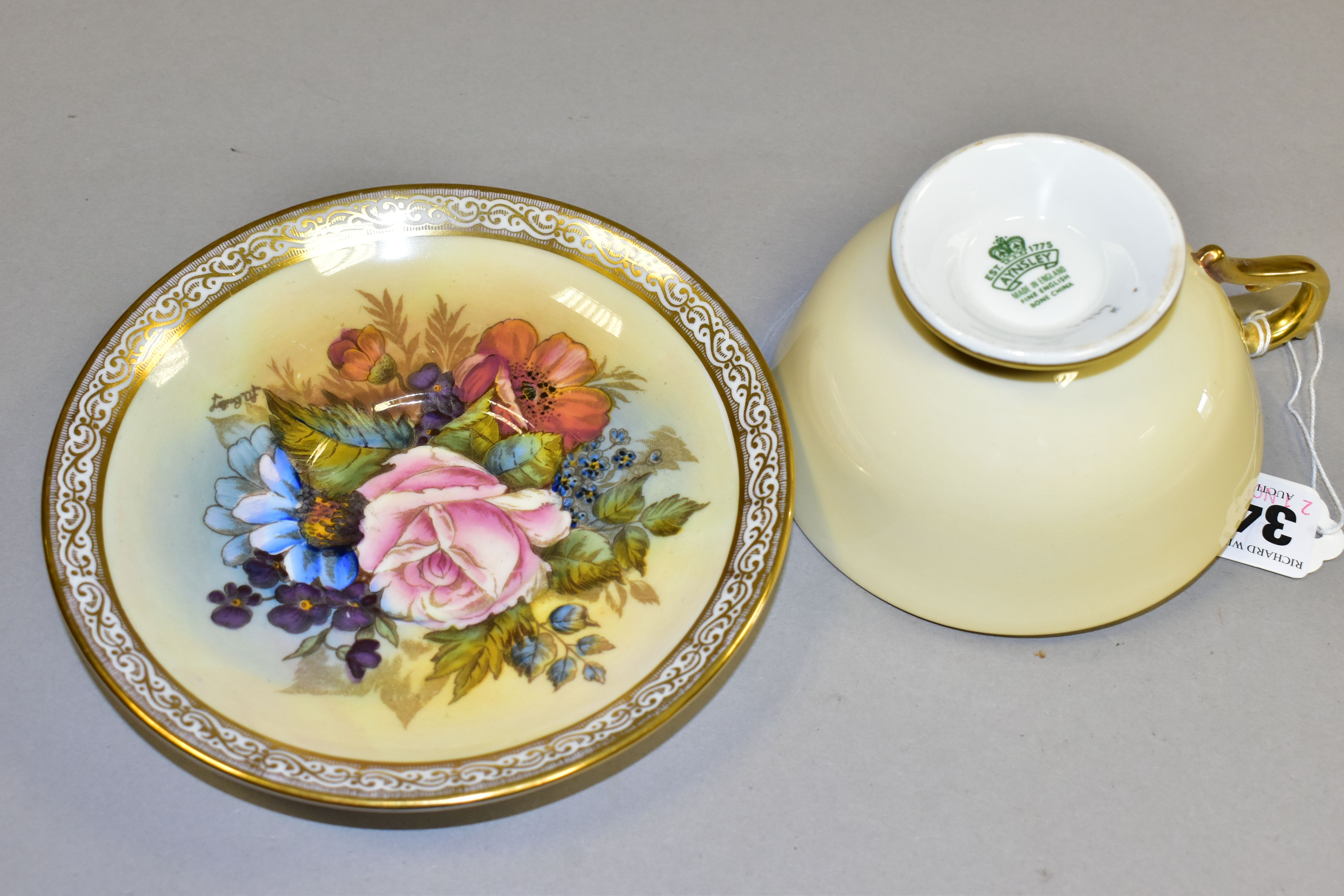 AN AYNSLEY FLORAL DECORATED TEA CUP AND SAUCER BY J. A. BAILEY, with scrolling border, the cup - Image 3 of 4