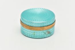 A ROUND GUILLOCHE ENAMEL TRINKET BOX, small circular box decorated with a teal guilloche enamel,