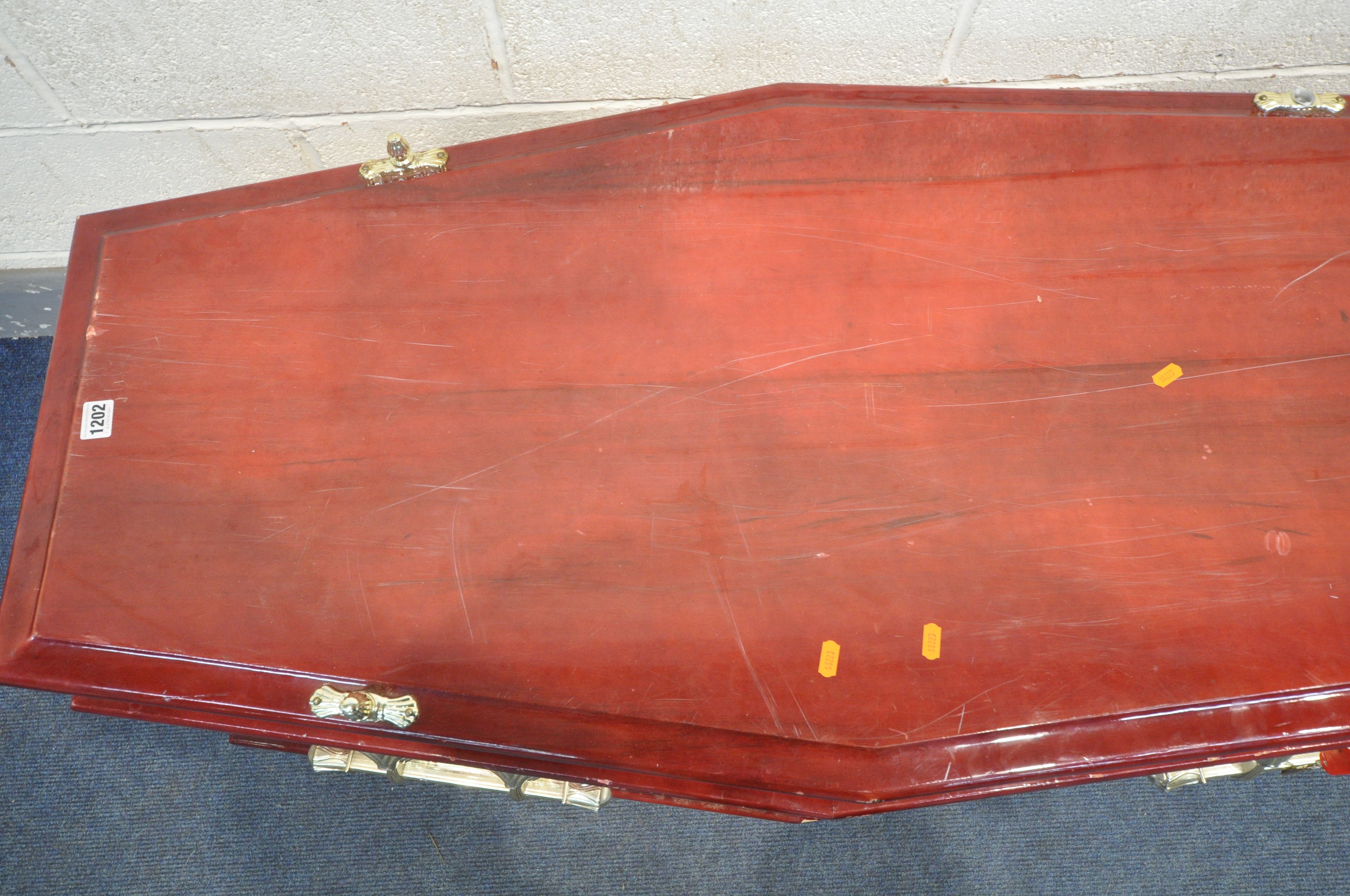 A BESPOKE COFFIN, with a glossy red finish, plastic finials and handles, length 211cm x depth 62cm x - Image 2 of 6