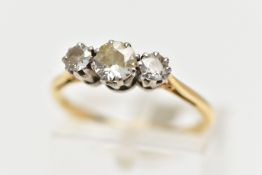 A THREE STONE DIAMOND RING, three old cut diamonds prong set in white metal, approximate total