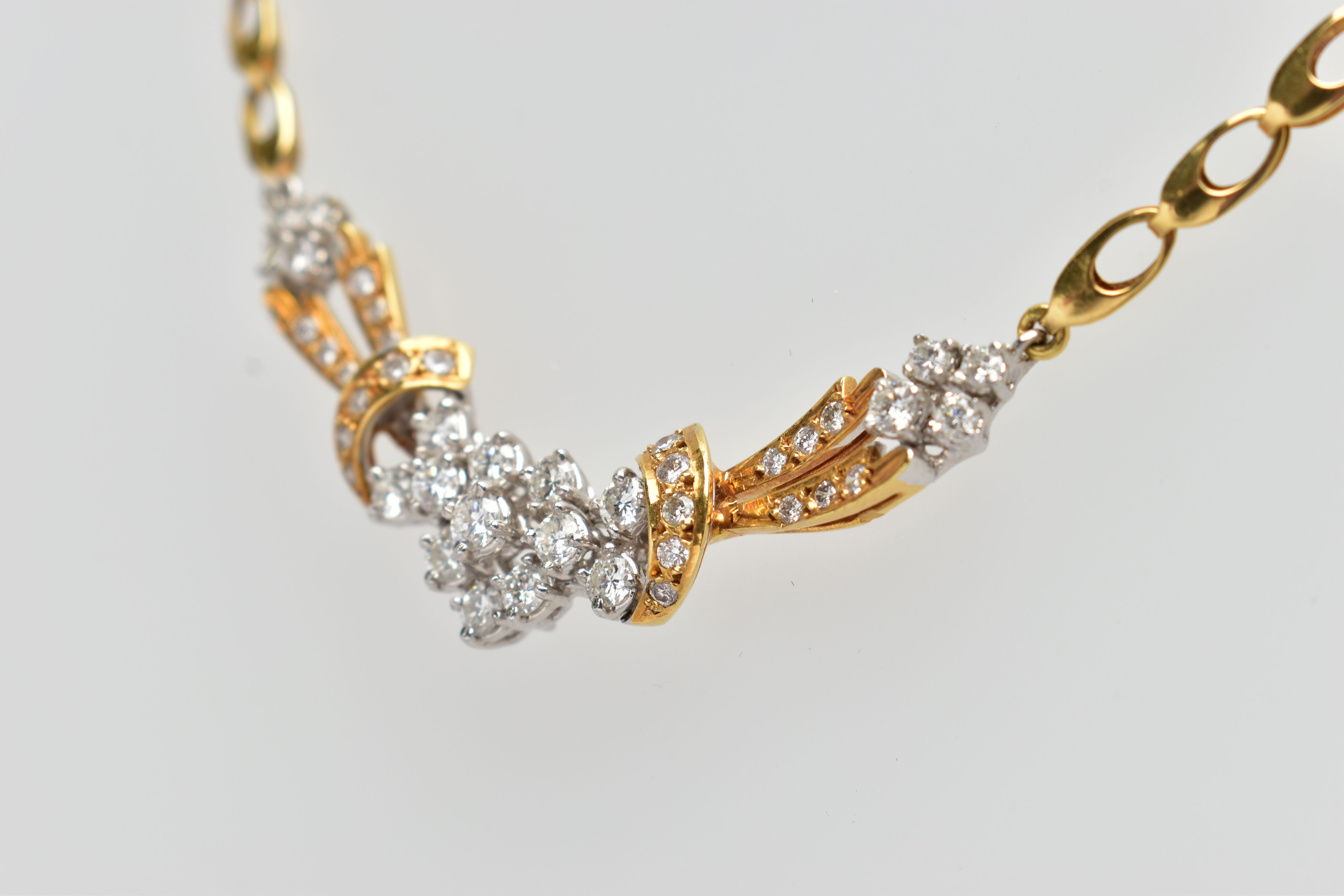 A YELLOW AND WHITE METAL DIAMOND NECKLACE, the front designed as an openwork panel set throughout - Image 5 of 8