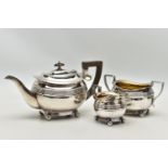 AN EDWARDIAN SILVER THREE PIECE SHAPED RECTANGULAR TEA SERVICE OF LATE GEORGIAN STYLE, horizontal