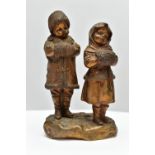 AFTER JOSEPH LE GULUCHE (1849-1915), two gilt bronze figures of children standing on a rocky base,