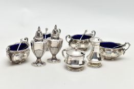 A PARCEL OF LATE VICTORIAN AND 20TH CENTURY SILVER CRUET ITEMS, comprising a set of four late