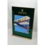 A LARGE ROLEX SHOP WINDOW DISPLAY STAND, WITH SLIDING MECHANISM, the central removable panel