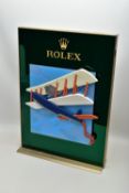 A LARGE ROLEX SHOP WINDOW DISPLAY STAND, WITH SLIDING MECHANISM, the central removable panel