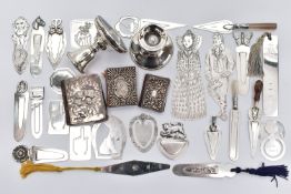 A PARCEL OF SILVER BOOK MARKS, SILVER COVERED NEEDLECASES, ETC, comprising a miniature book of