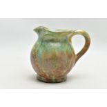 PIERREFONDS - A FRENCH STUDIO POTTERY JUG, the exterior covered in green and brown crystalline