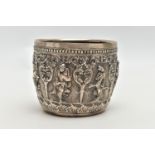 A LATE 19TH / EARLY 20TH CENTURY INDIAN SILVER BOWL, the exterior cast in relief with figures