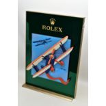 A LARGE ROLEX SHOP WINDOW DISPLAY STAND WITH SLIDING MECHANISM, the central removable panel