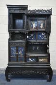 A JAPANESE MEIJI PERIOD HARDWOOD SHODONA CABINET, with an arrangement of shelves and cupboards,
