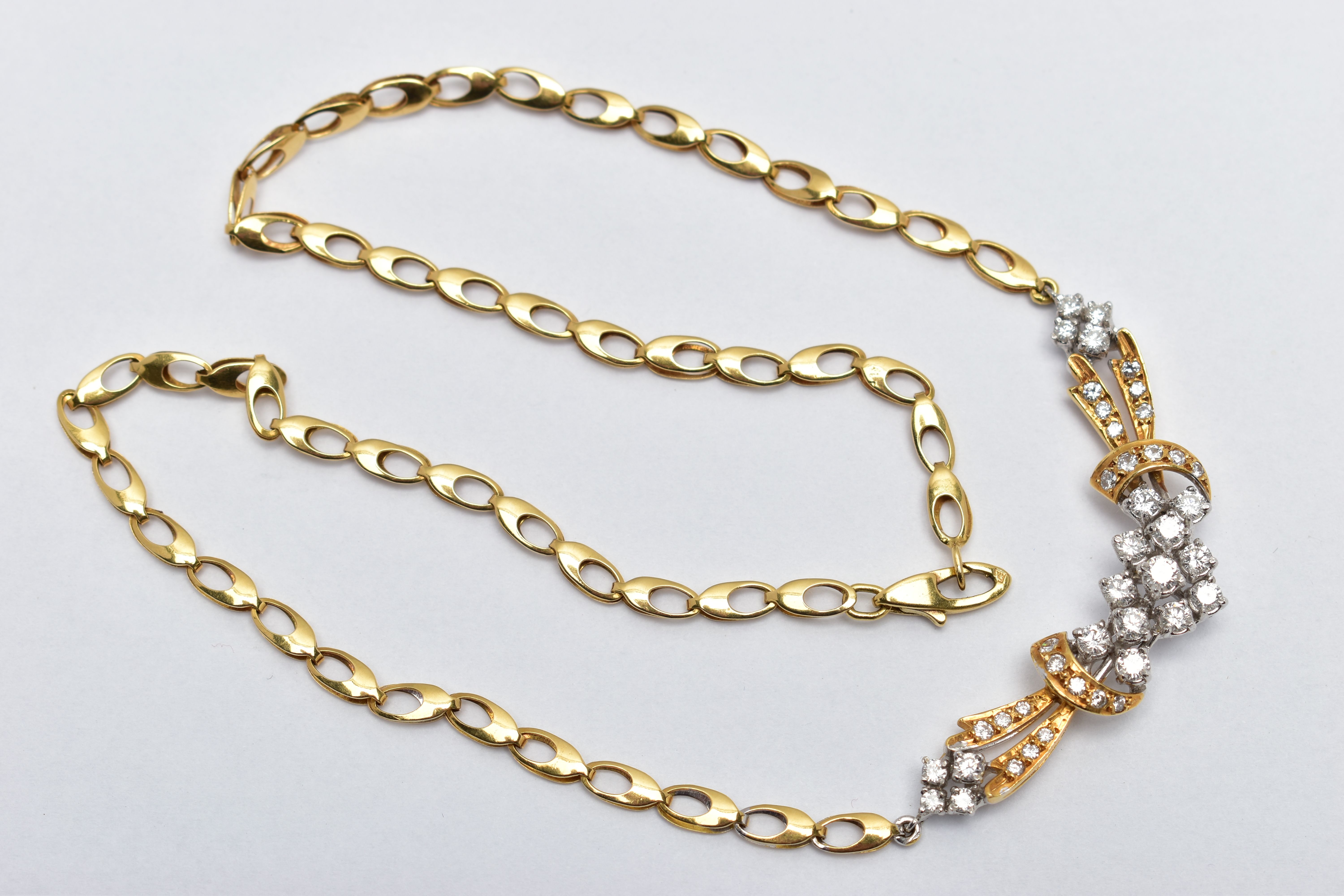 A YELLOW AND WHITE METAL DIAMOND NECKLACE, the front designed as an openwork panel set throughout - Image 8 of 8