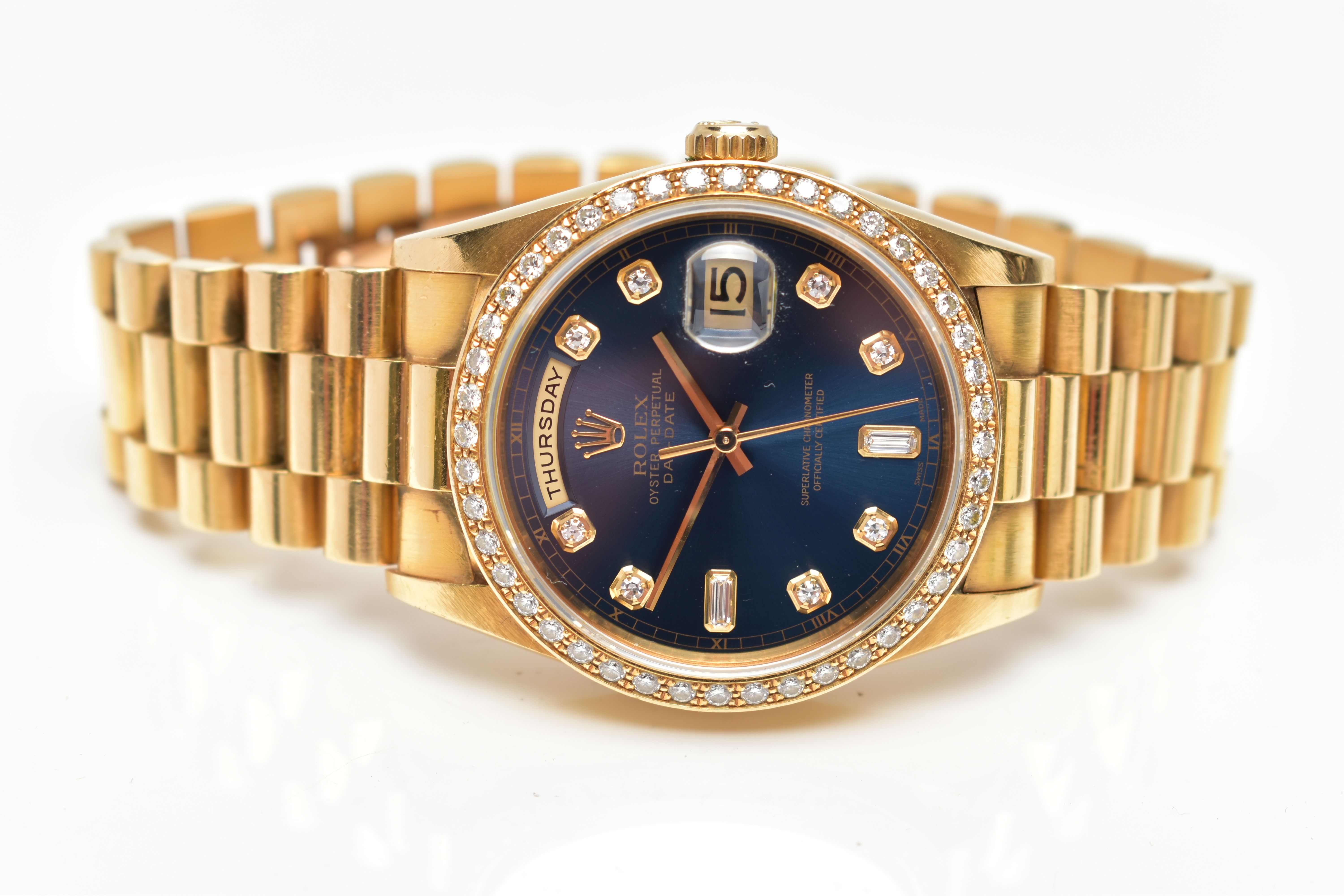 AN 18CT YELLOW GOLD AND DIAMOND DAY-DATE ROLEX WRISTWATCH, the dark blue dial with diamond dot - Image 4 of 15