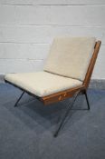 ROBIN DAY (B.1915-2010) A MID CENTURY TEAK 'CHEVRON' CHAIR, on metal legs, unsigned, with loose