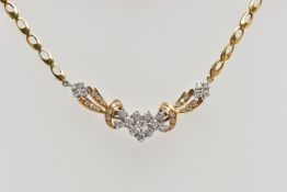 A YELLOW AND WHITE METAL DIAMOND NECKLACE, the front designed as an openwork panel set throughout