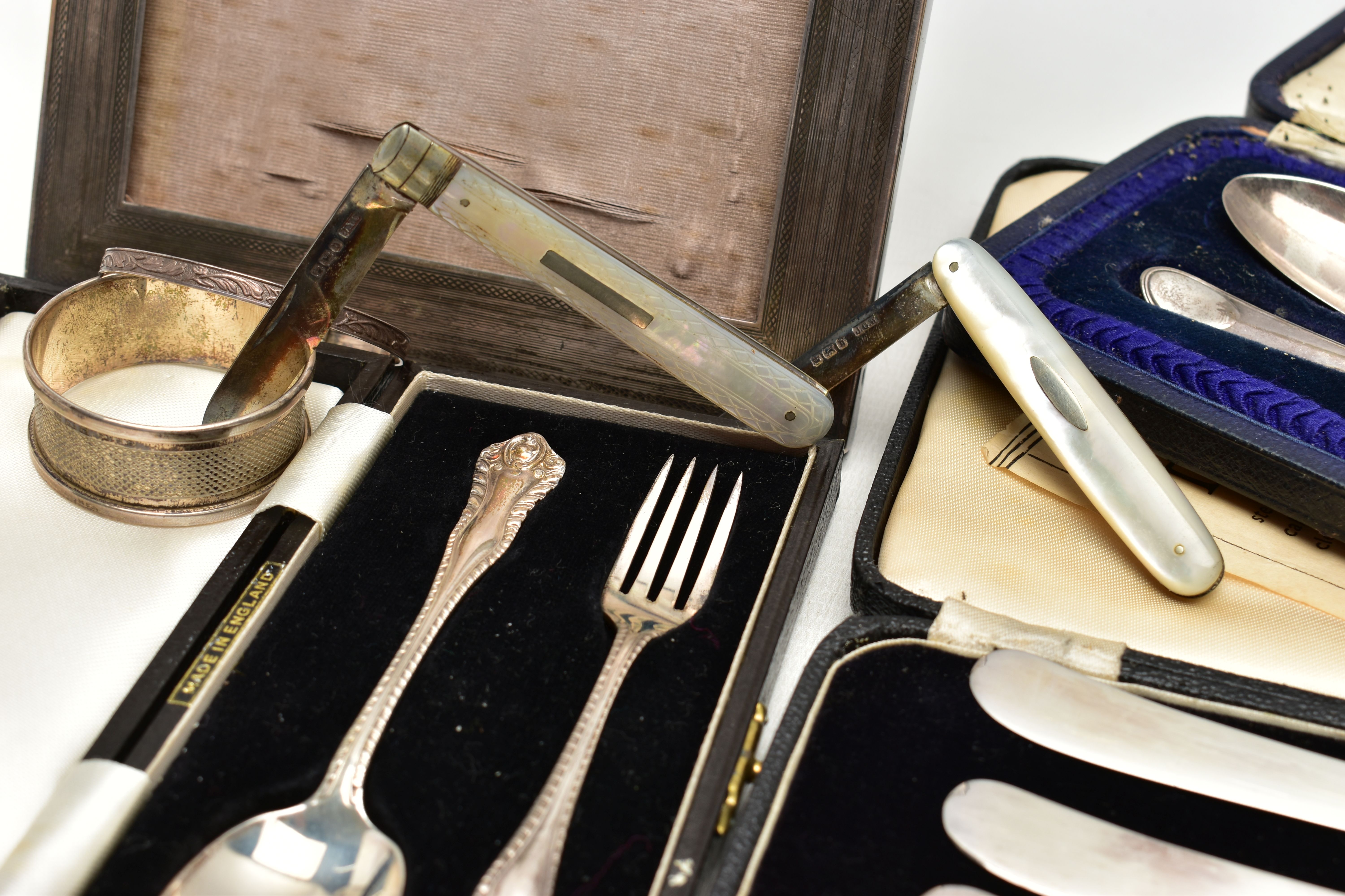 A GROUP OF CASED AND LOOSE SILVER, comprising a rectangular photograph frame, engine turned - Image 8 of 9