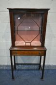 AN EDWARDIAN MAHOGANY AND BOX STRUNG INLAID DISPLAY CABINET, the single astragal glazed door